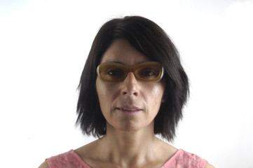 Woman with vintage sunglasses on white