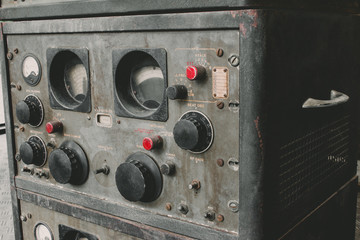 The old classic rack box of military communication radio bandswitching station. Military communications receiver or radio communication control panel grunge style.