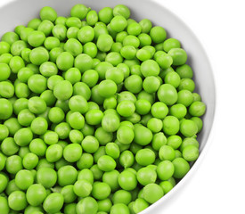 Bowl with fresh green peas on white background, closeup