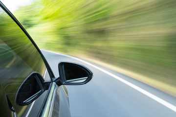 Obraz na płótnie Canvas car driving with green motion blur