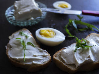 Sandwich with feta cheese and arugula