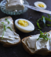 Sandwich with feta cheese and arugula