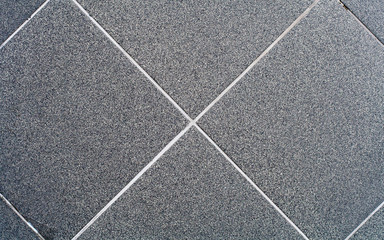 Tiled wall, gray/black. texture, background.