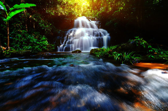 background blur Mandang waterfall in Thailand.And popular with tourists and photographers.