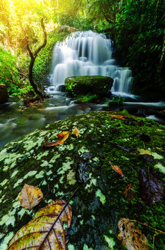 background blur Mandang waterfall in Thailand.And popular with tourists and photographers.