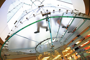 Modern Glass Staircase Silhouette of walking People in shanghai china.