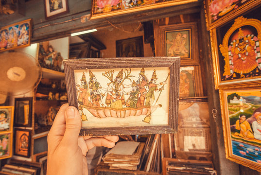 Vintage picture with historical scene and heroes in frame on flea market
