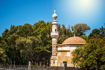 Fototapeta na wymiar Mosque with sunny skies in the background, Rhodes, Greece, the old town