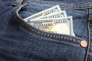 dollar banknotes in jeans pocket closeup. Business concept. pocket money.