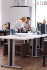 designers in office at the wooden furniture manufacture