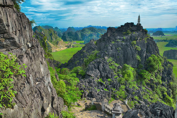 Amazing highland view of the rice fields, limestone rocks and mountain top Pagoda from Hang Mua...