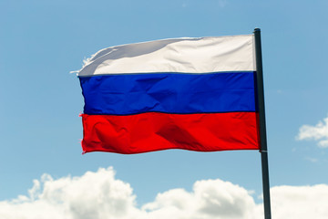 Fototapeta na wymiar St. Petersburg, Russia - June 28, 2017: Flag of Russia in the wind in St. Petersburg.