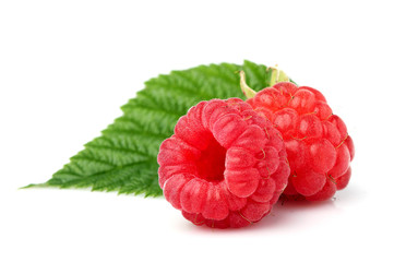 Raspberry with leaves closeup isolated.
