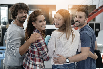 Group of students in business training standing in office