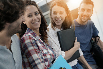 Group of students in business training standing in office