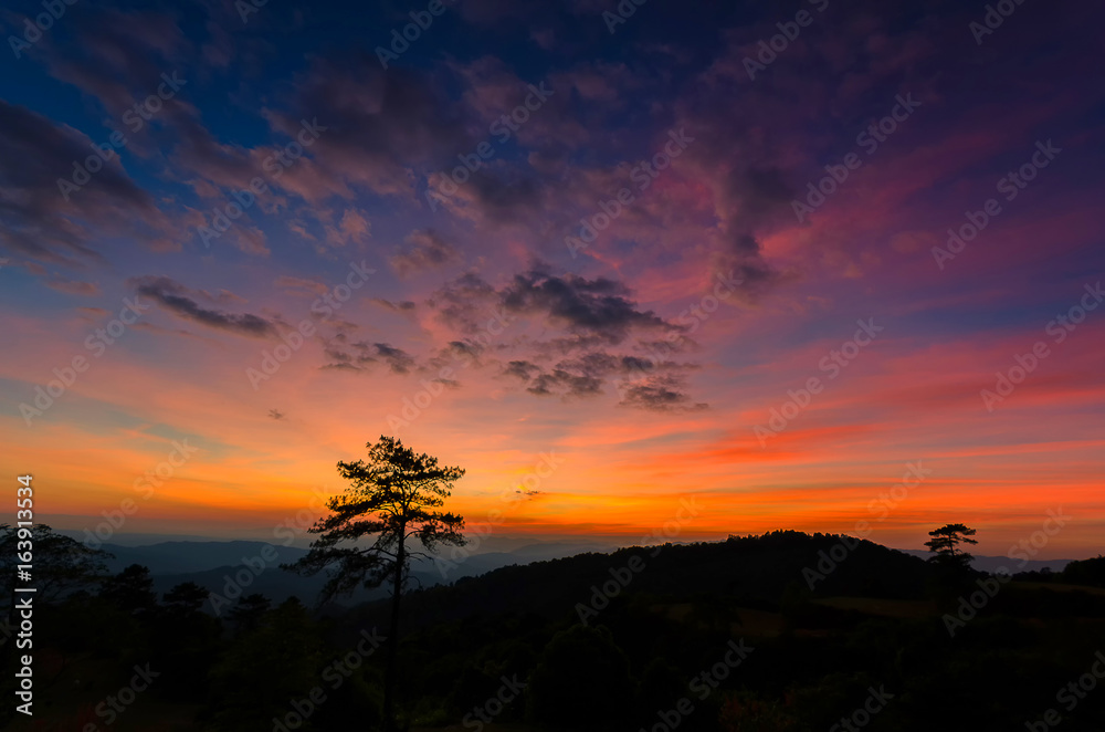 Wall mural Twilight light on mountain.