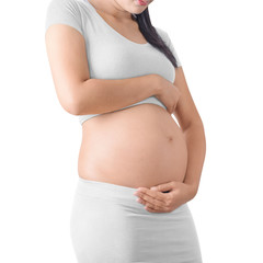 Beautiful Belly of a pregnant woman is on white background with clipping path