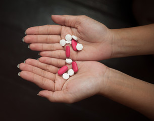 Pills on female hands
