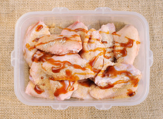 raw chicken wings in marinade ready for cooking