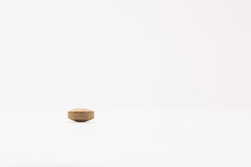 Pills on white background