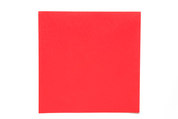 Red color paper sheet on white background used for decoration or design element