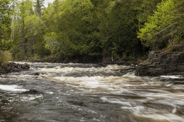 Fototapeta premium Current River Cascades / A river with cascading rapids in Ontario Canada.