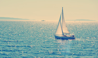 Sailboat cruising in the Mediterranean sea