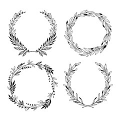 Hand drawn vector illustration. Vintage decorative laurel wreaths. Tribal design elements. Perfect for invitations, greeting cards, blogs, prints and more.