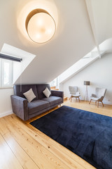 Modern apartment with white walls and light wooden floor
