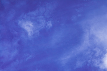 Blue sky and thin clouds background