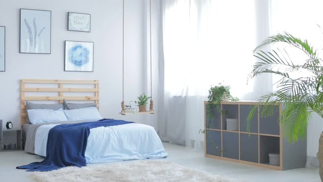 Bright and blue kids and parents bedroom
