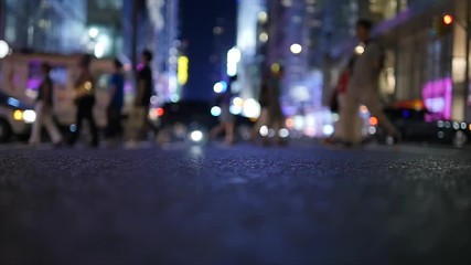 crowd of people walking on busy street commuting through the city metropolis 