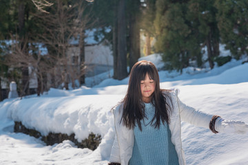 Fototapeta na wymiar Asian girl in winter