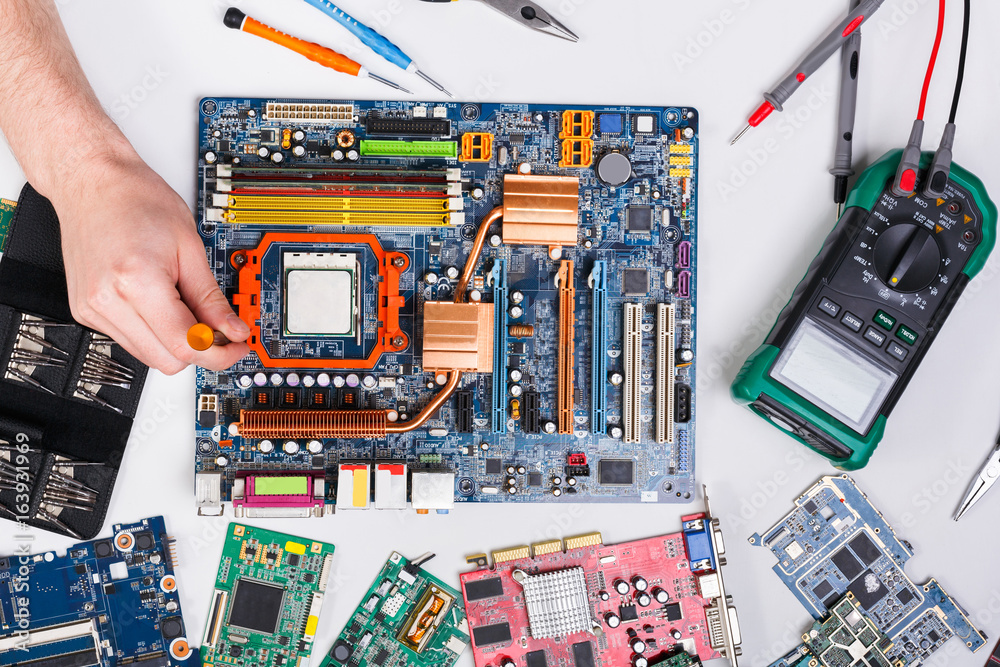 Poster technician upgrade of computer top view, motherboard