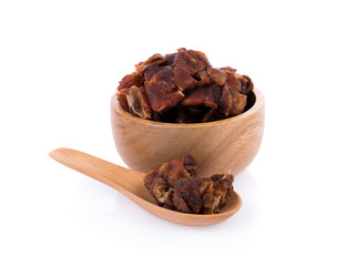 Tamarind in spoon on the white background
