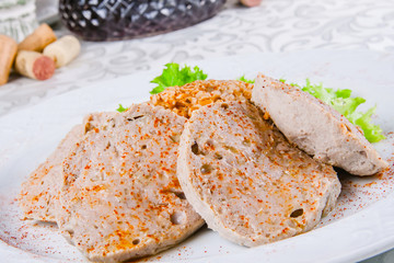 Armenian kyufta served with pilaf with spelt