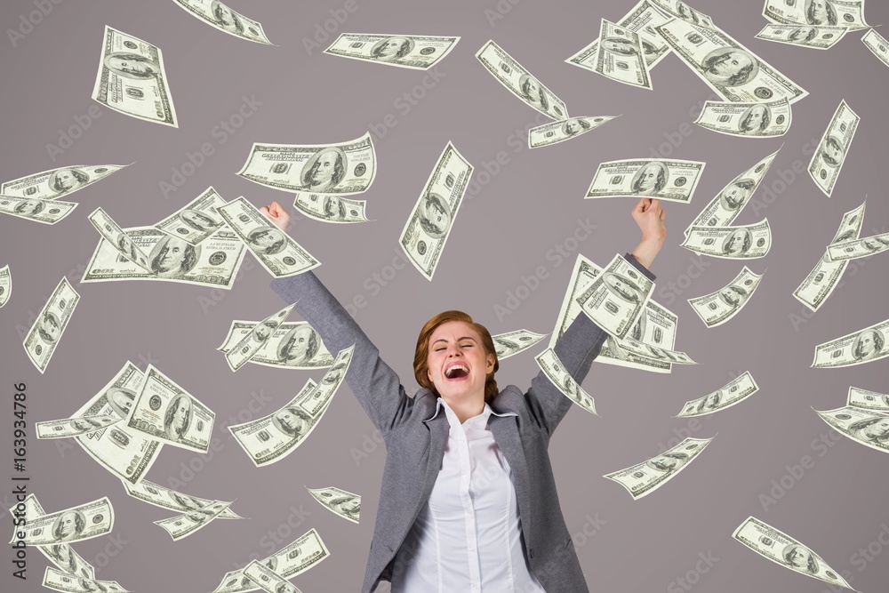 Poster Excited business woman with money rain against purple background