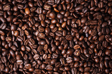 Fototapeta premium Tekstura palonych gotowych do picia kawy z bliska.Coffee Bean Scene.BlackGround Coffee.