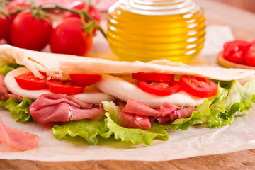 Piadina with ham and lettuce. 