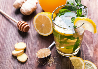 Tea with mint and lemon in a glass cup