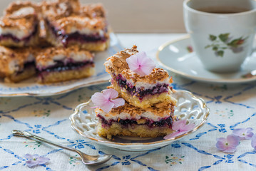 Blackcurrant coconut slice with tea