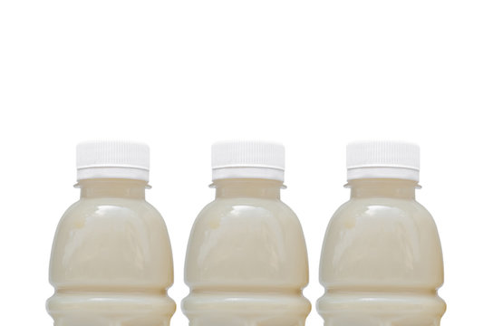 Bottle of soybean milk on white background