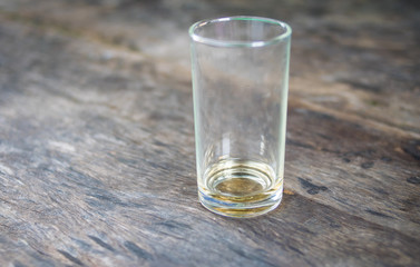 empty a glass on wooden table