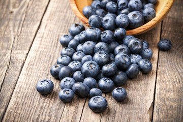 Fresh blueberries on wooden board