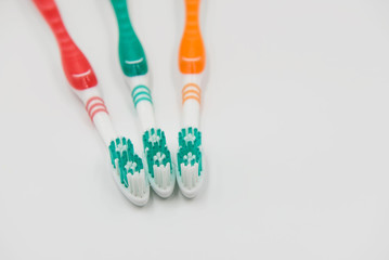 Closeup new toothbrushes isolated on a white background.