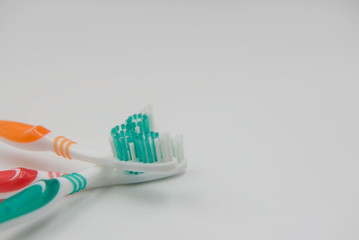 Closeup new toothbrushes isolated on a white background.