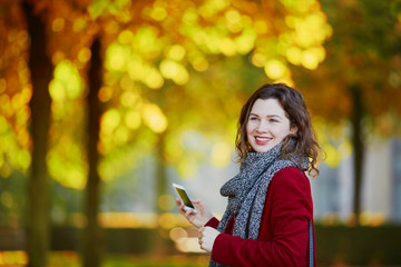 Beautiful young girl in autumn park