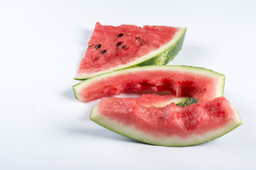 Watermelon leftovers isolated above white background
