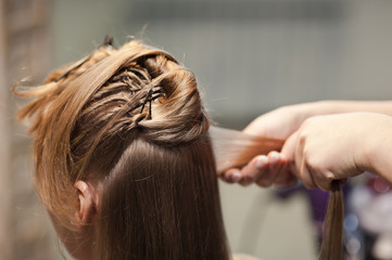 Hairstyle of the bride. Beautiful wedding hairstyle for the bride. Large with details