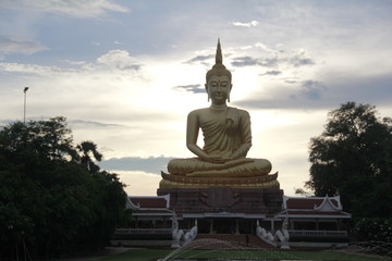 Fototapeta premium Popular tourist The statue sculpture Buddha meditated. And represent the Buddha in Buddhism. Located outdoors in a temple in Thailand.